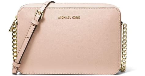 michael kors light pink crossbody purse|michael kors pink suitcase.